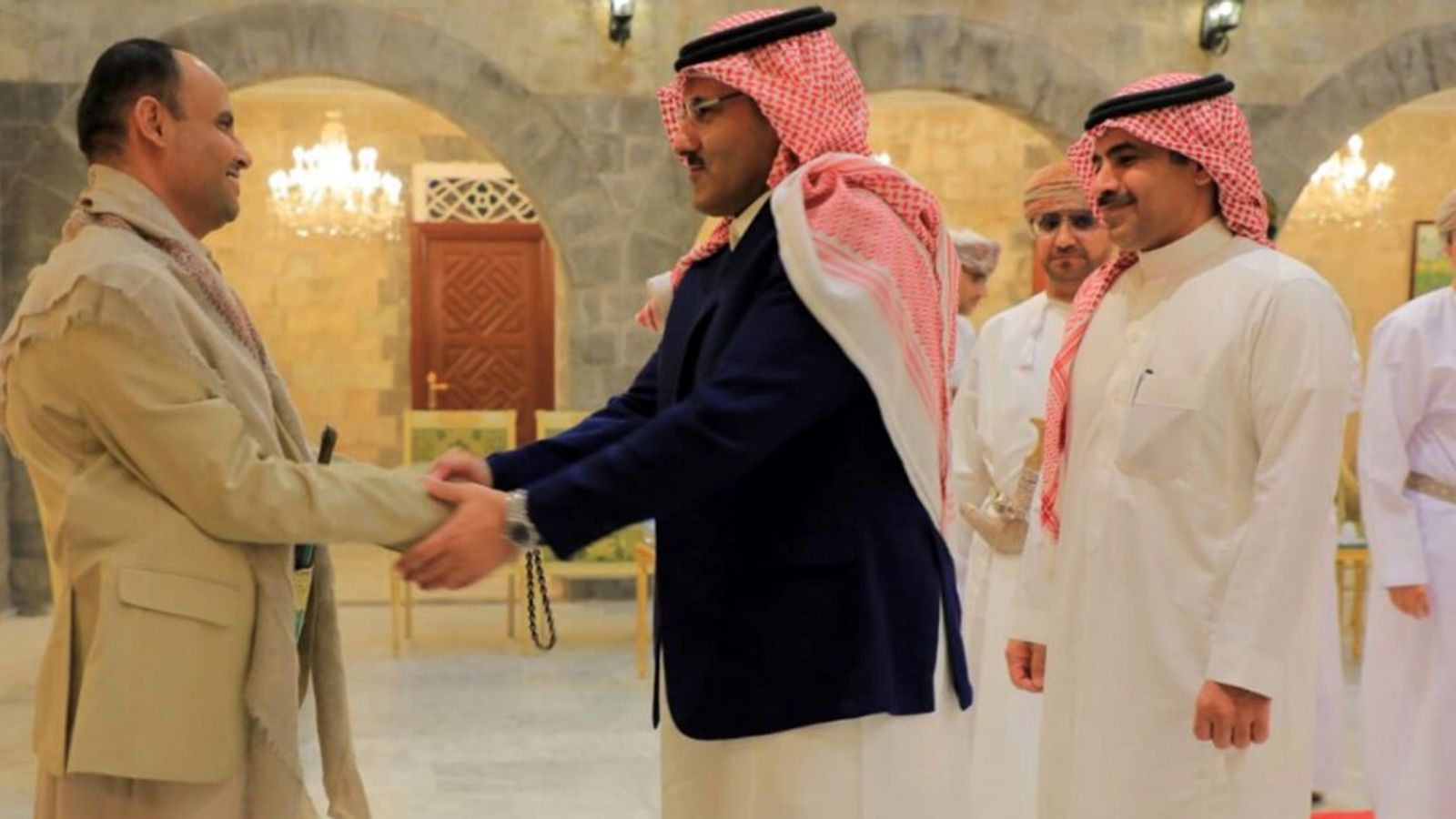 Field Marshal Mahdi Mohammed Al-Mashat, Chairman of the Houthi's Supreme Political Council, shakes hands with the Saudi ambassador to Yemen, Mohammed Al-Jabir, in Sanaa on 9 April 2023. Pic: Ahmed Baider